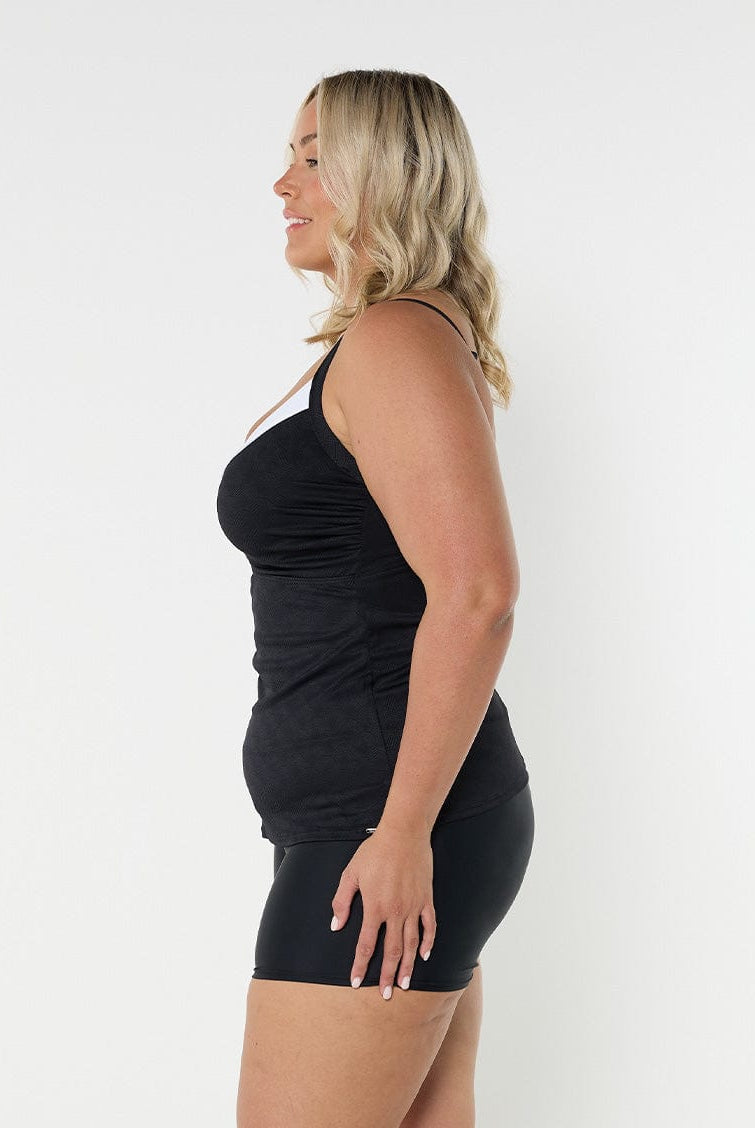 model showing side of black textured women's tankini