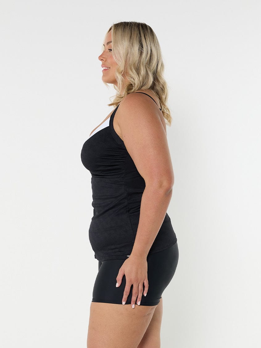 model showing side of black textured women's tankini