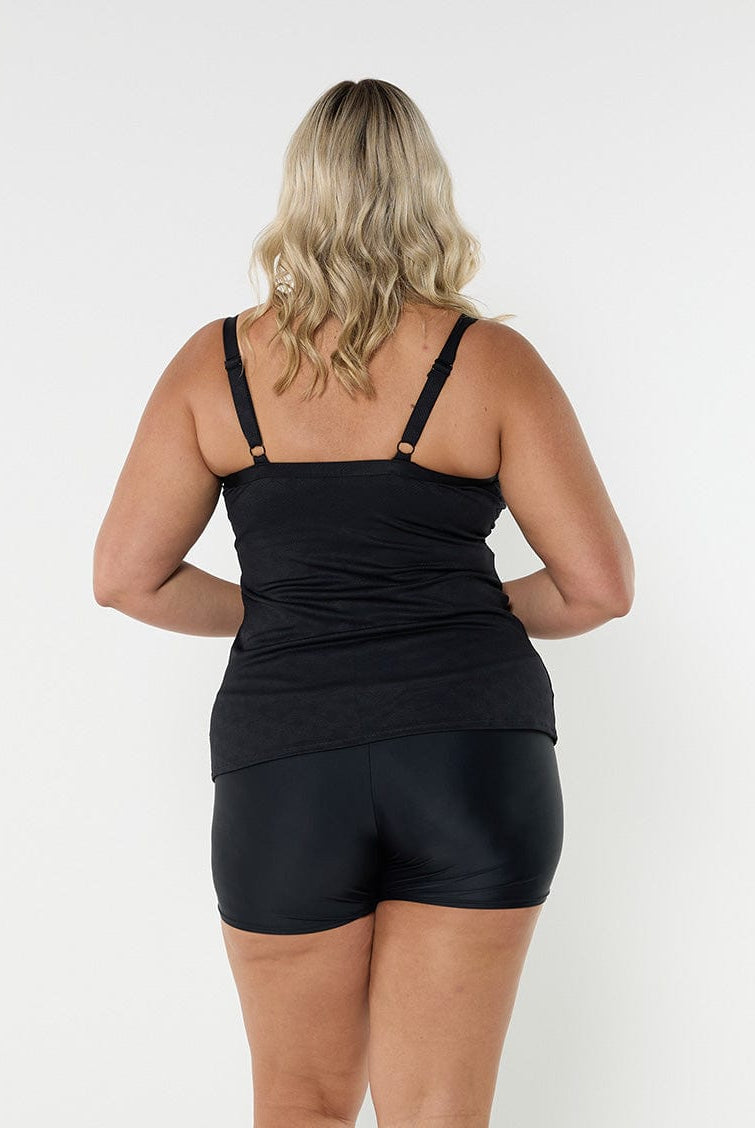 Back of blonde model in studio wearing textured underwire tankini top