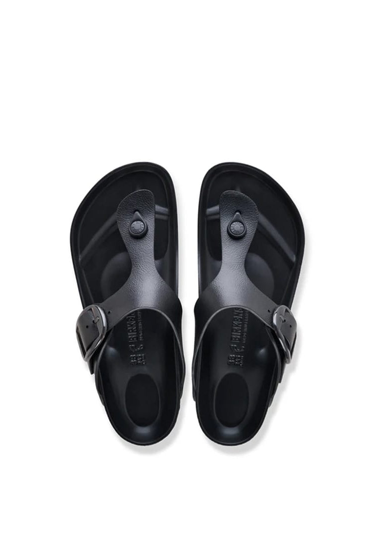 A pair of black slide sandals shown from a top-down view on a clean white background.