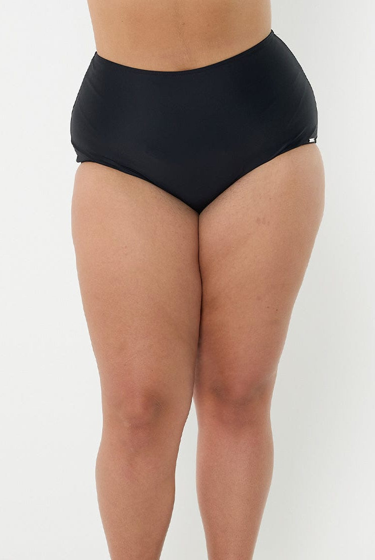 model wearing black high waisted bikini bottom