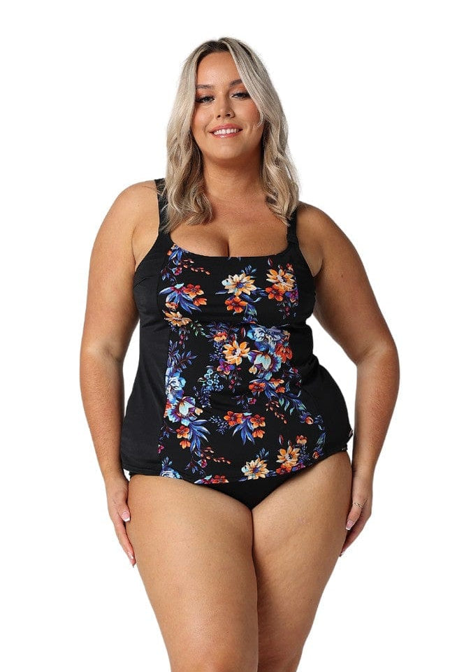 Model wearing black floral tankini top