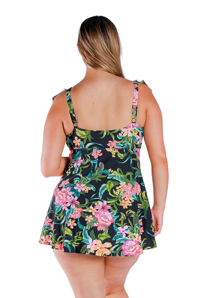 back of model wearing black pink and green floral swimming dress