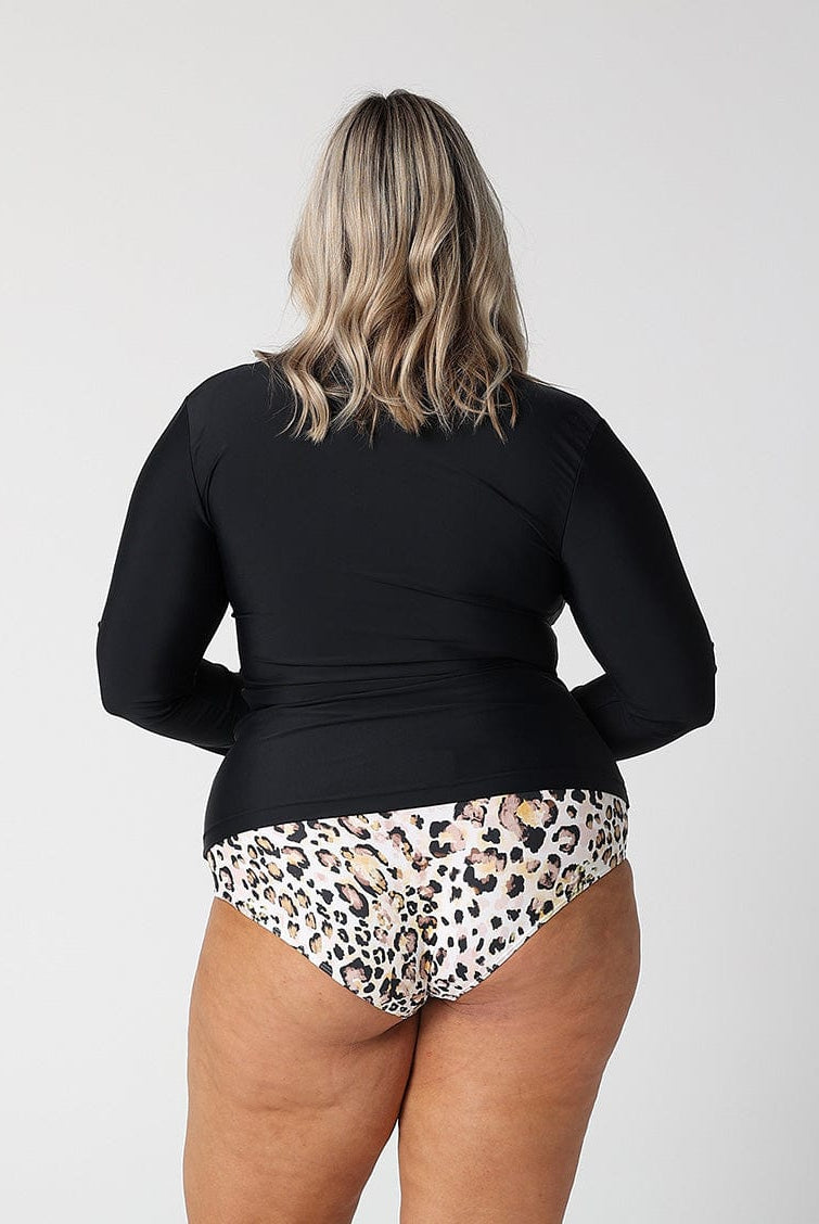 Model showing side of black long sleeve rash vest