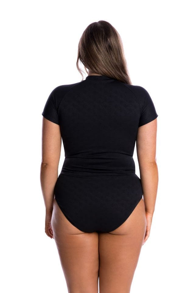 Person wearing a black swimsuit on a white background