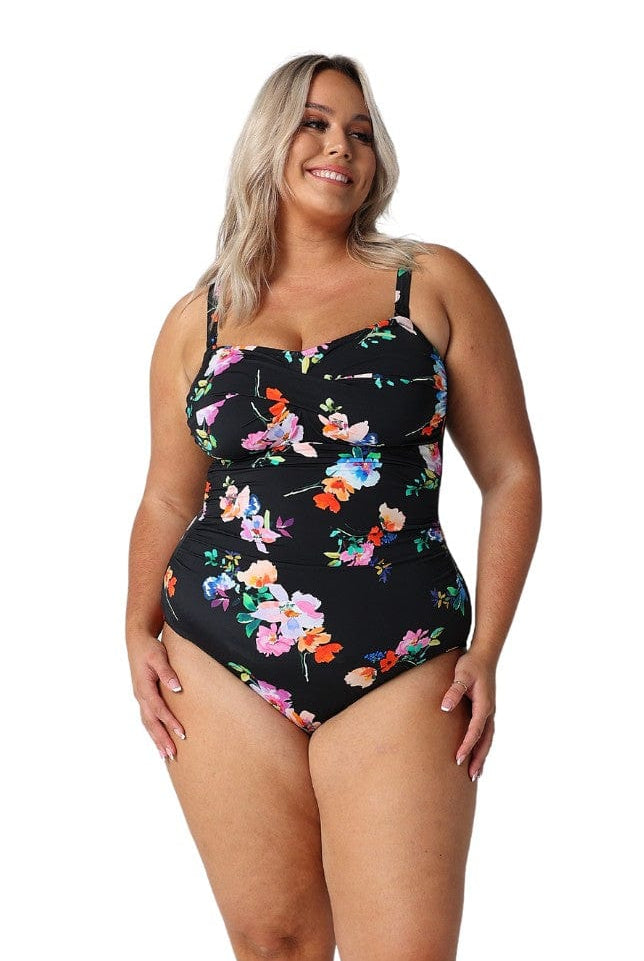 Model wearing black floral womens one piece swimsuit