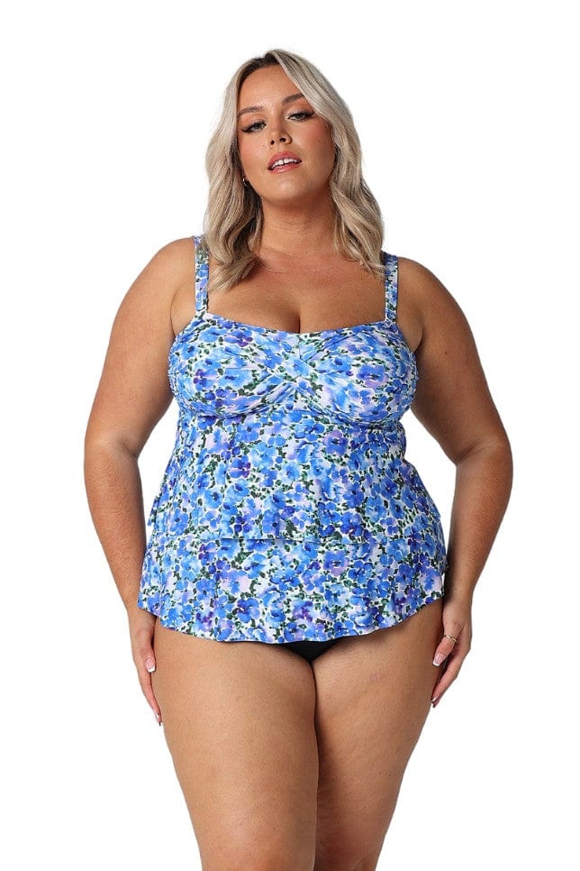 Model wearing blue floral tiered tankini top