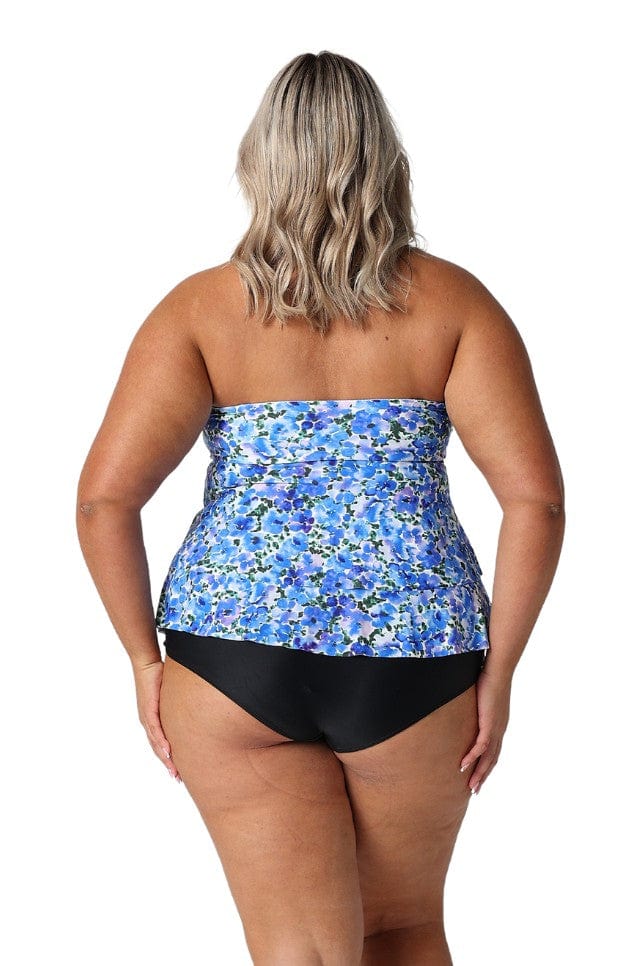 Model showing back of blue floral strapless tankini top