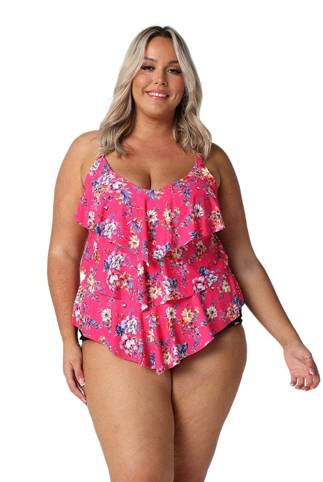 Model wearing hot pink floral tiered tankini top