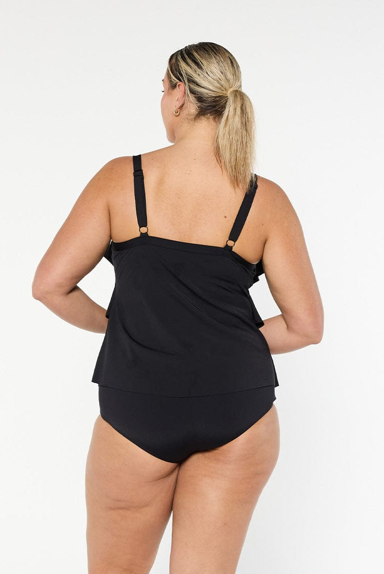 Model wearing chlorine resistant black tankini top
