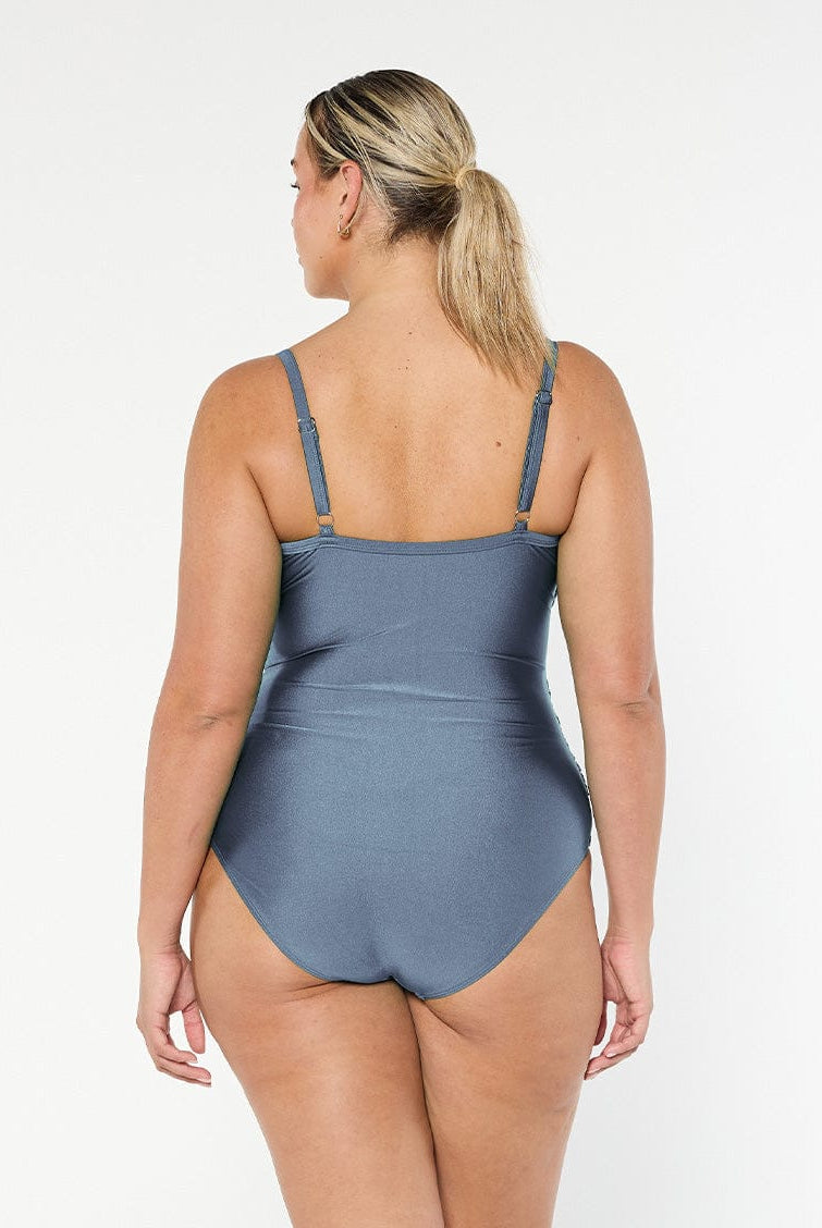model showing back of shiny grey women's one piece