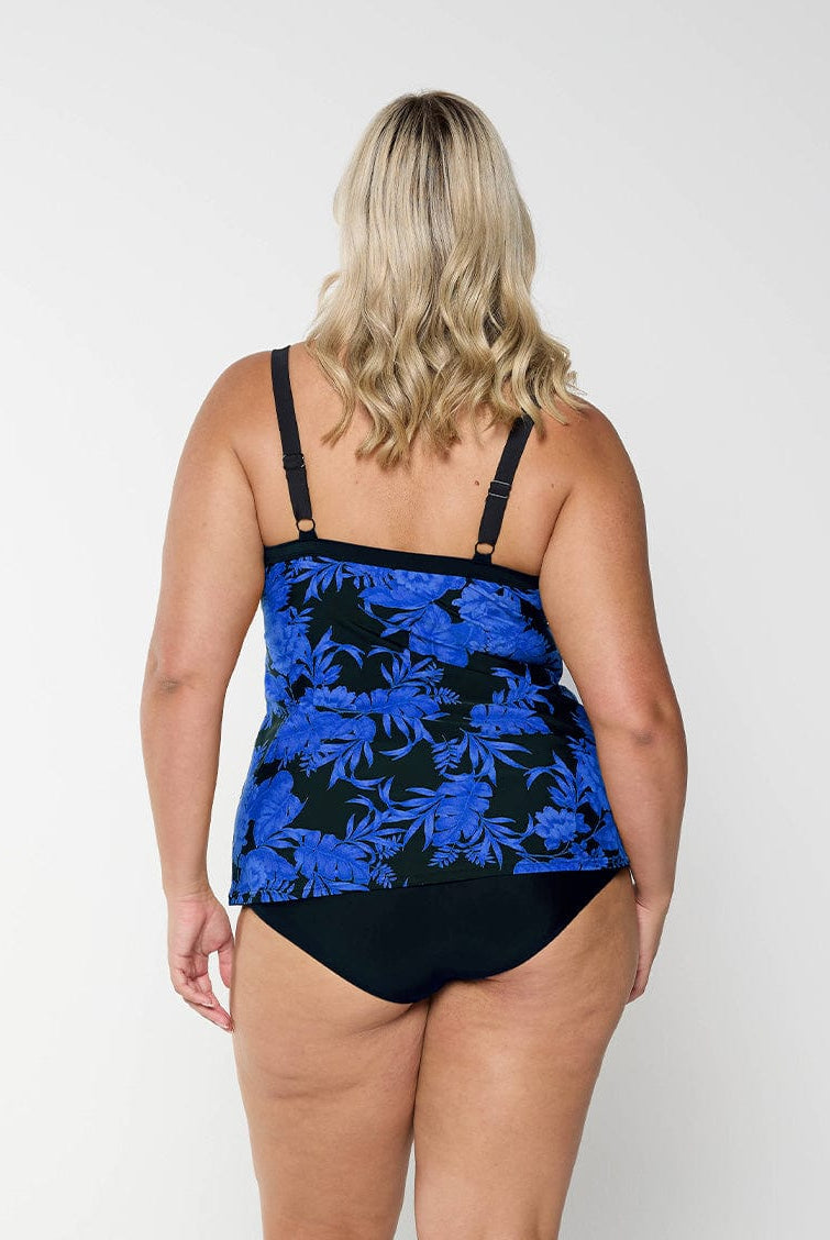 model showing back of blue and black floral underwire tankini with adjustable straps