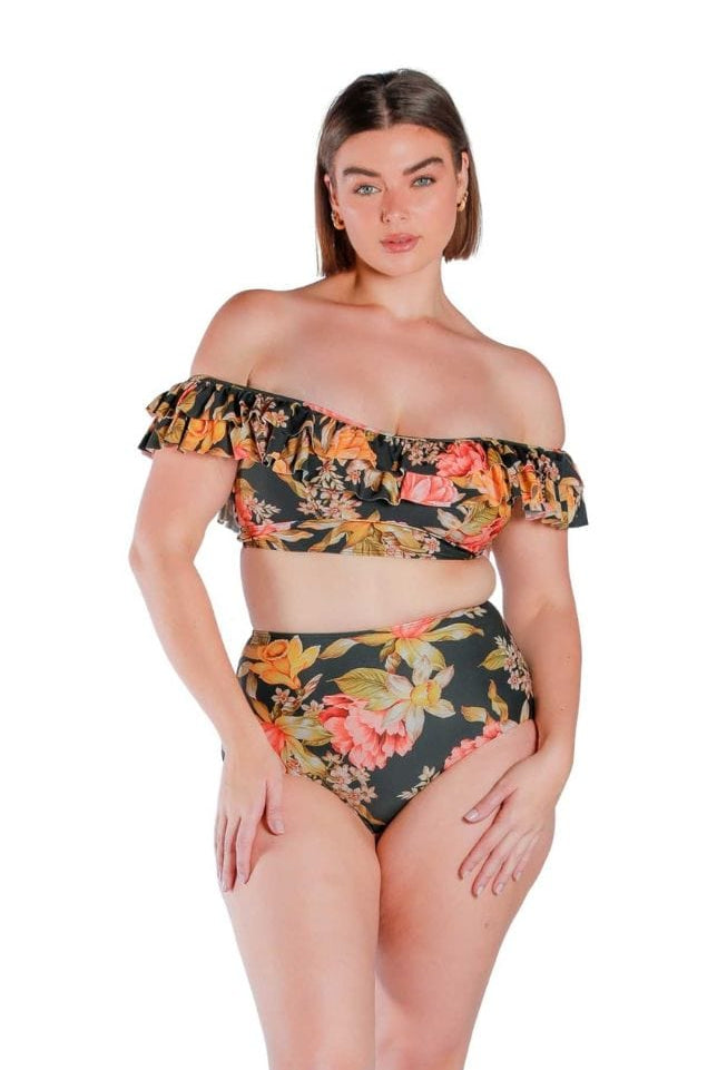 Model wearing yellow, orange and black floral printed high waisted pant