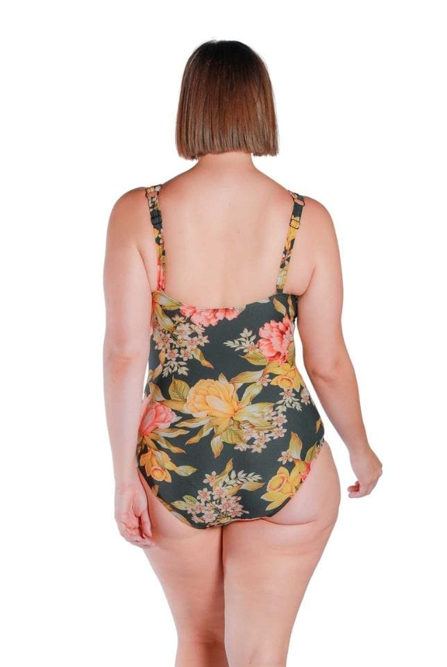 Model wearing floral and black printed V neck one piece
