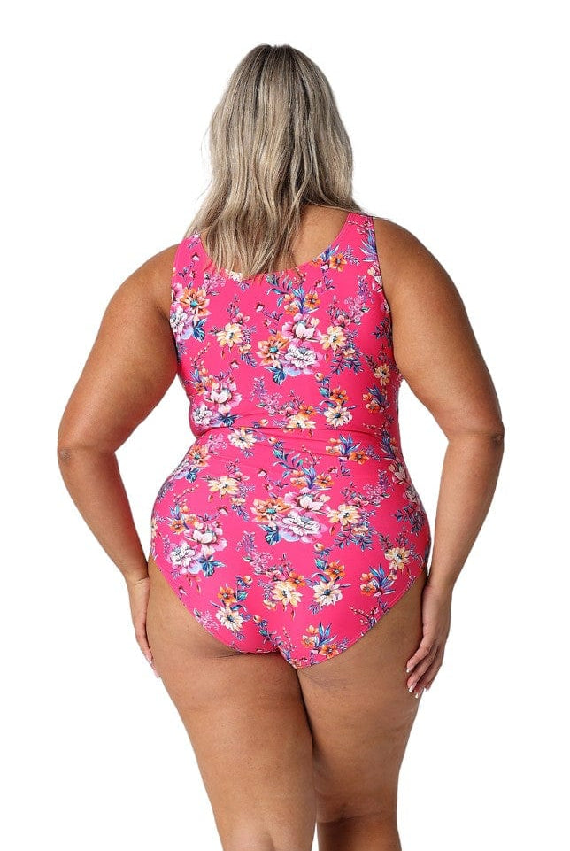 Model showing back of hot pink floral sleeveless swimsuit