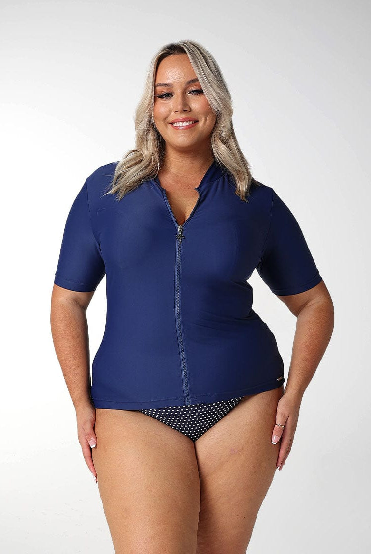 Model showing front of short sleeve rash vest with a full zip