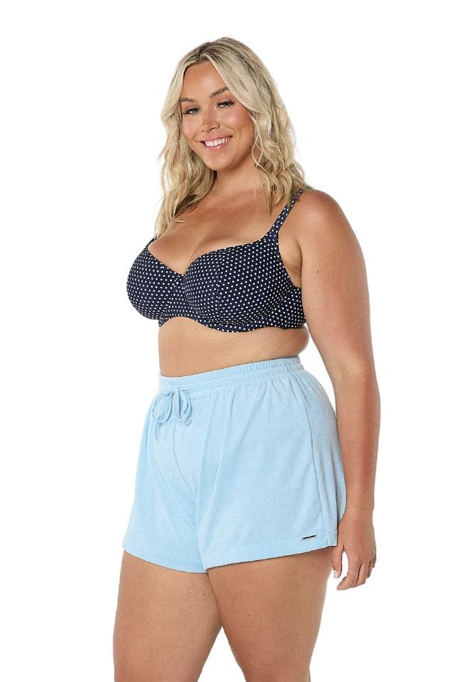 Model wearing light blue drawstring shorts