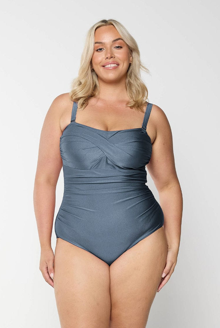 model wearing grey women's one piece