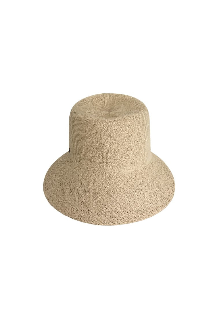 Beige bucket hat on a white background