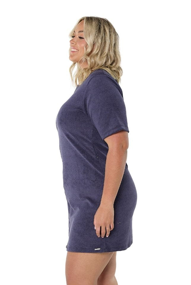 Model showing side of navy terry towelling zip up dress