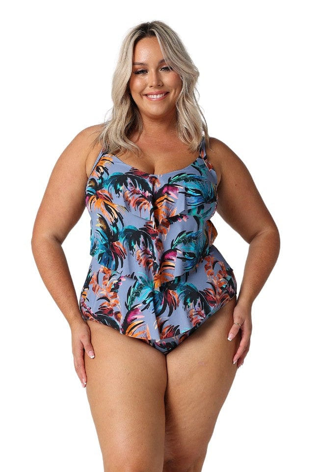 Model wearing tropical print 3 tier one piece