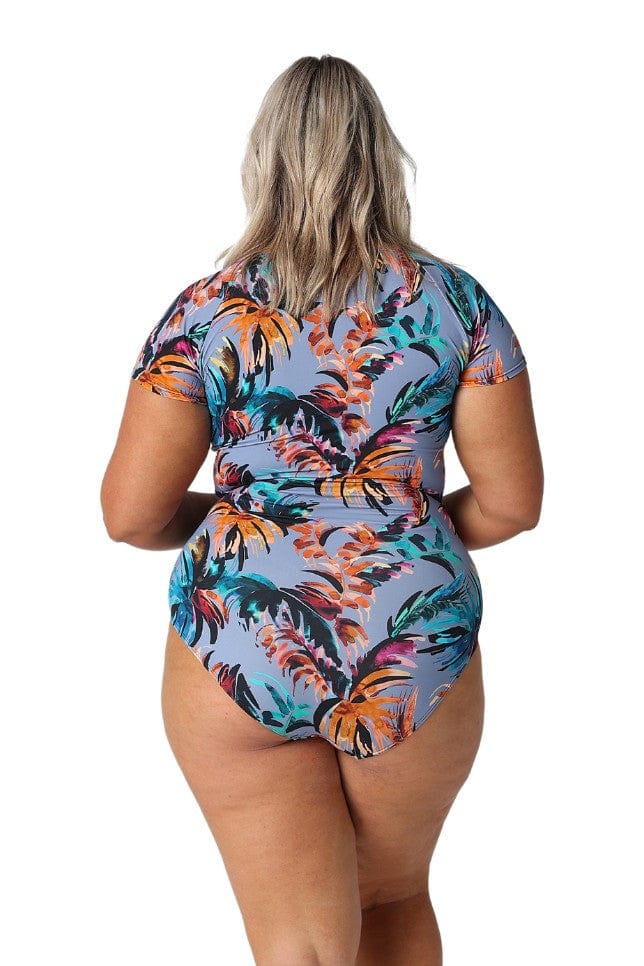 Model showing back of tropical print short sleeve one piece