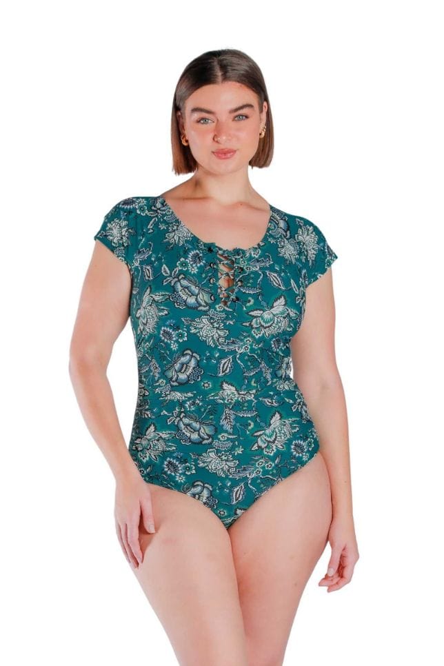 Front shot of model wearing Sardinia teal hues floral printed tie front one piece 