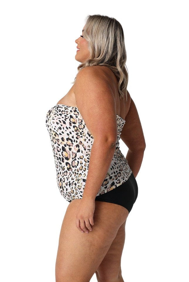 Model showing side of leopard print bandeau tankini and black pant