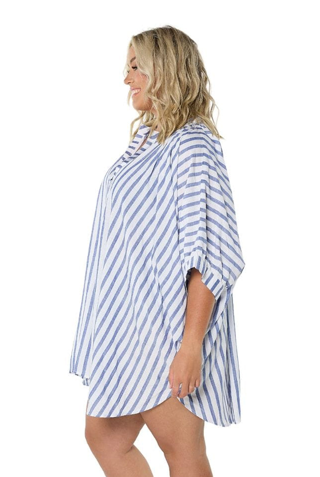 Model showing side of navy and white striped cover up