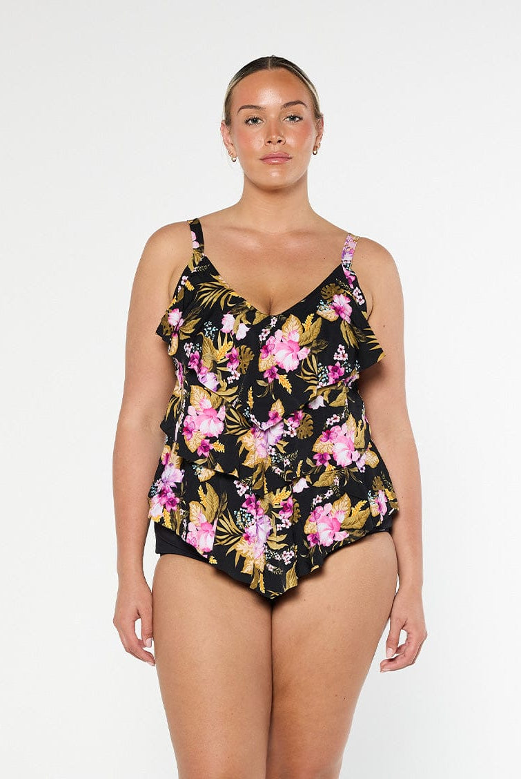 Blonde model wears stunning black and pink floral 3 tier tankini top in chlorine resistant fabric
