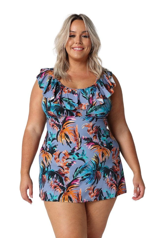 Model wearing blue tropical print swim dress