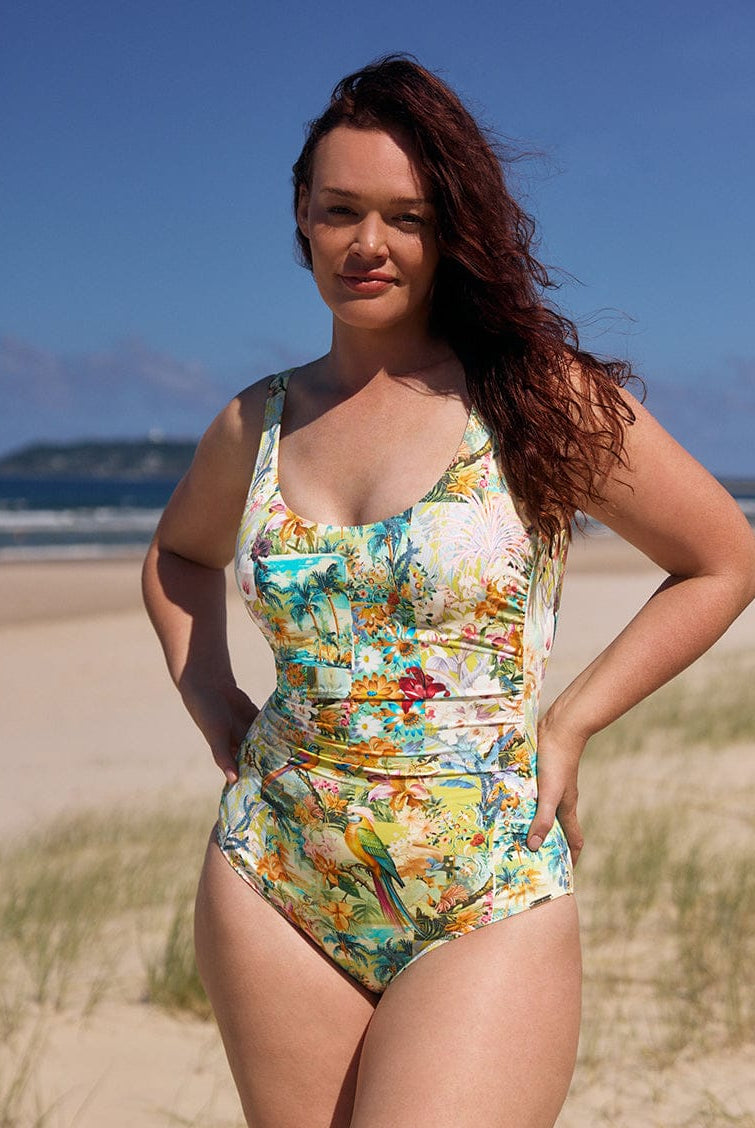Woman wearing a colorful swimsuit on a beach