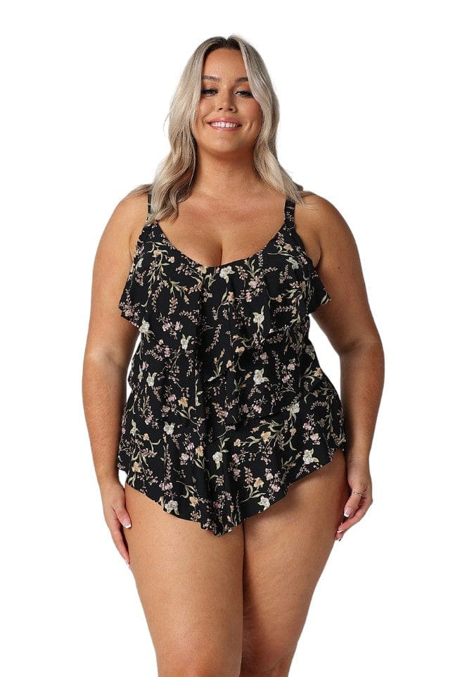 Model wearing black floral 3 tier tankini top