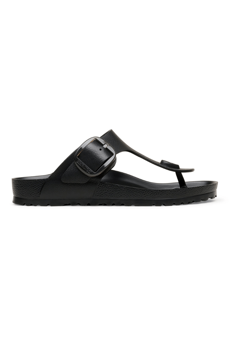 Black slide sandal on a white background