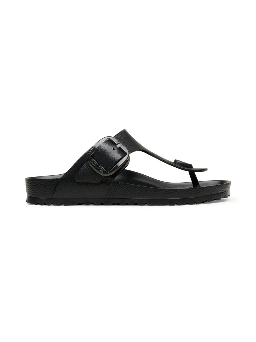 Black slide sandal on a white background