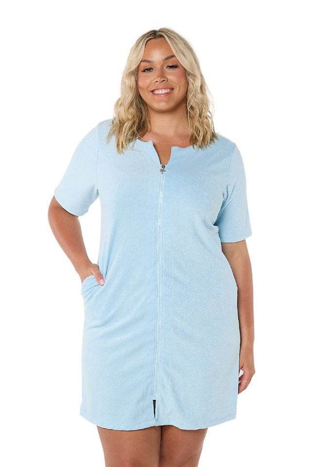 Model wearing light blue terry towelling dress with zip front