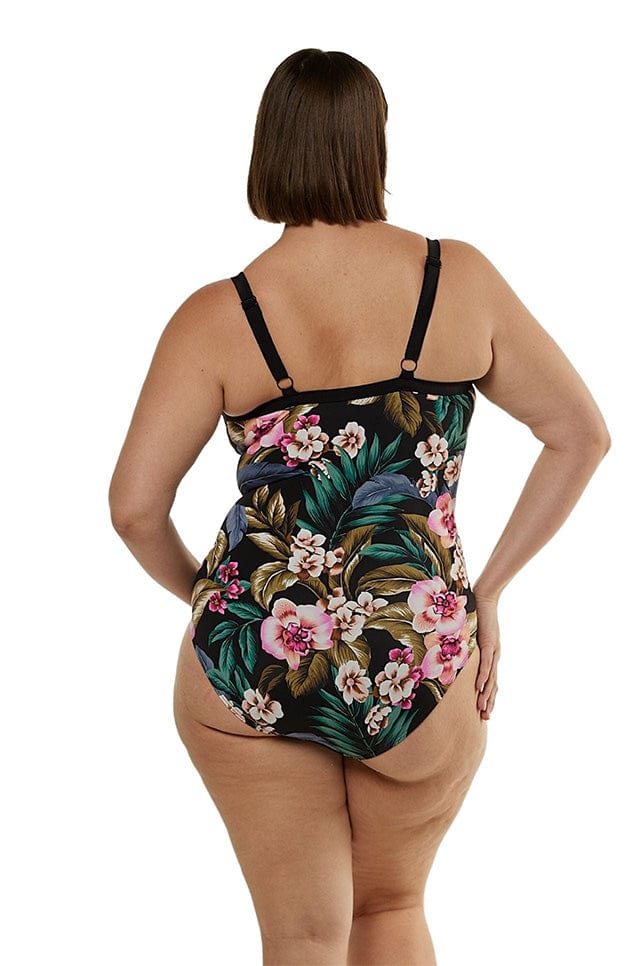 back view of model wearing black floral print one piece swimwear