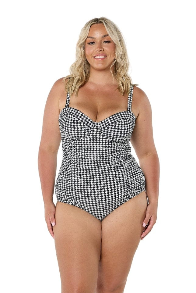 model wearing hounds tooth underwire one piece
