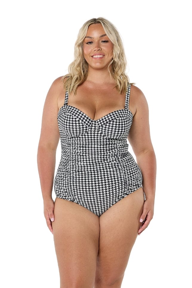model wearing hounds tooth underwire one piece