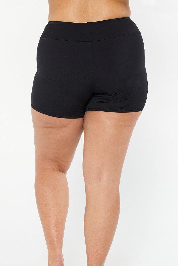 model showing back of black boyleg style swim short