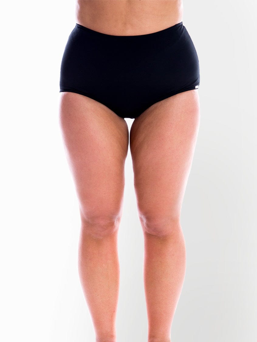 model wearing black high waisted swim bottom