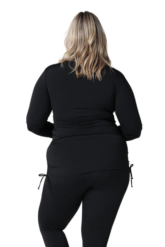 model showing back of black long sleeve rash vest