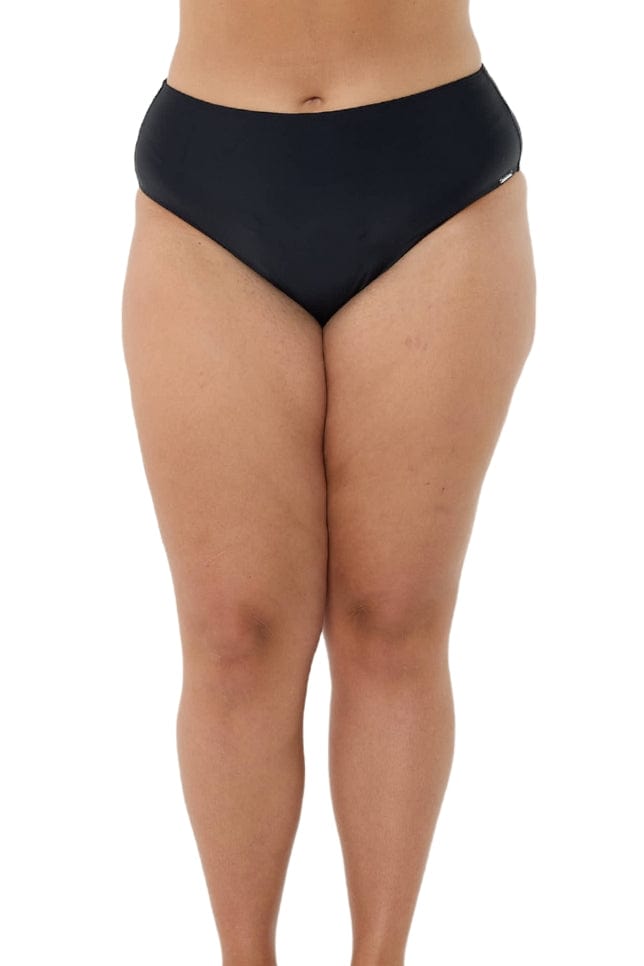 model wearing black high rise swim pant