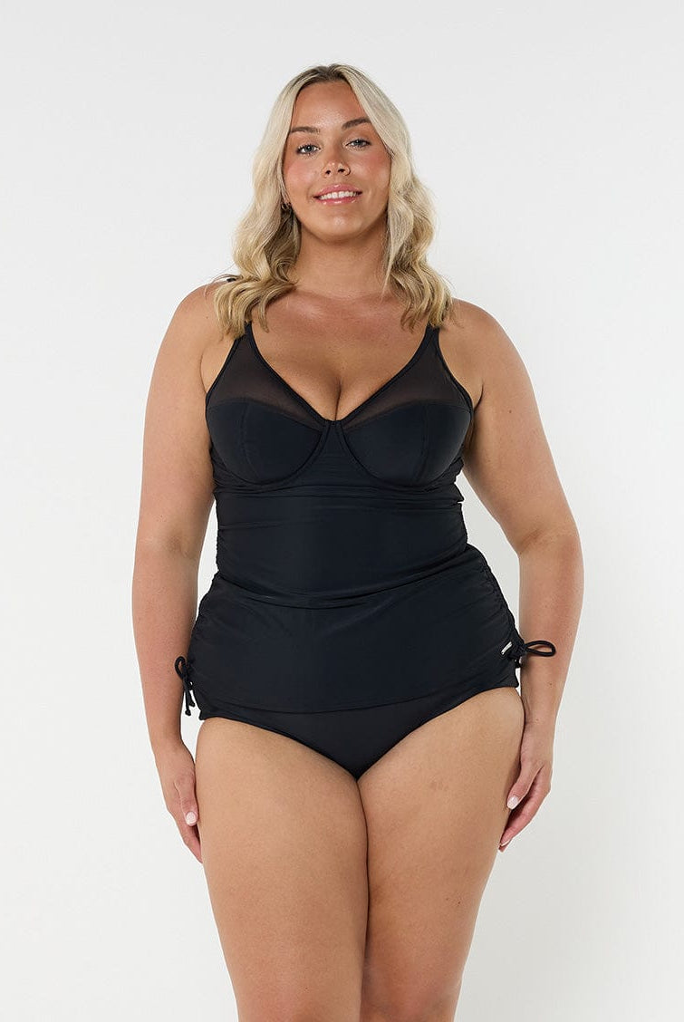model wearing black mesh tankini with underwire