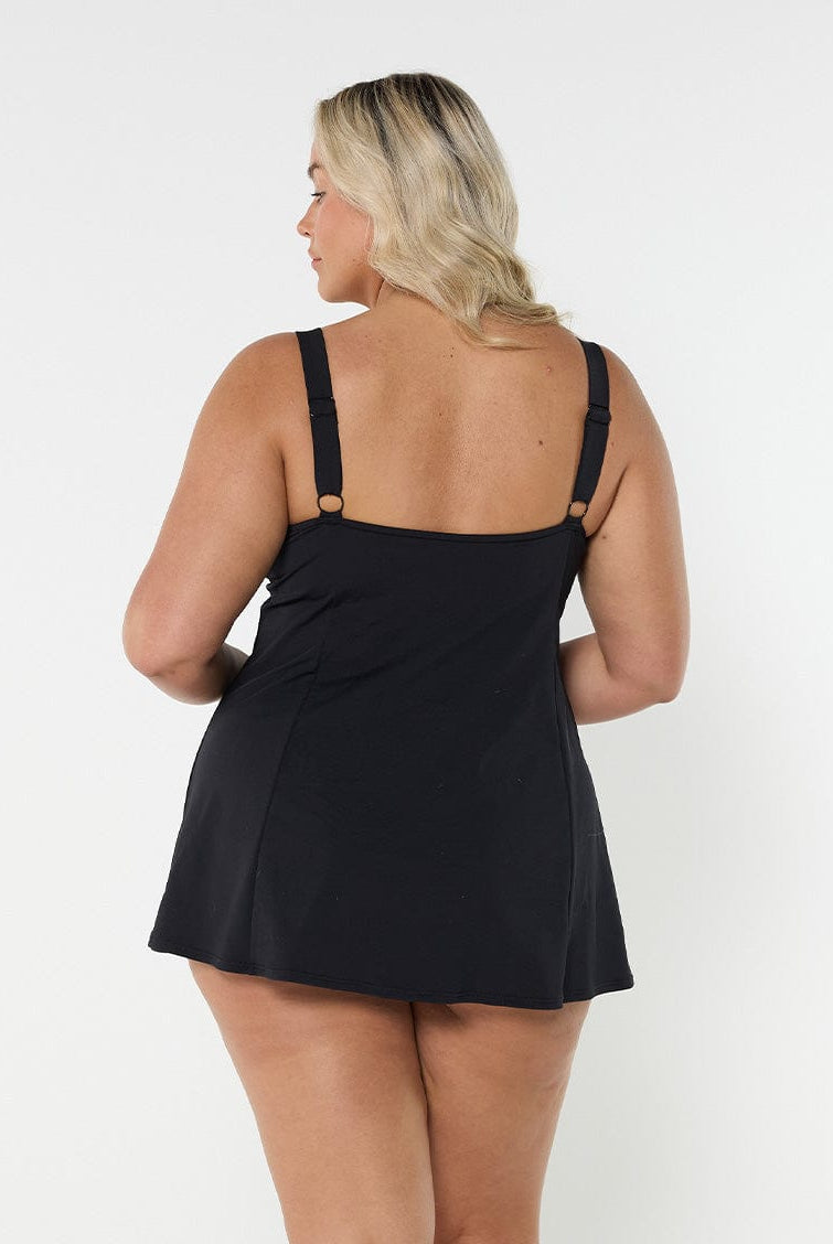 model showing back of black and white paisley print swim dress
