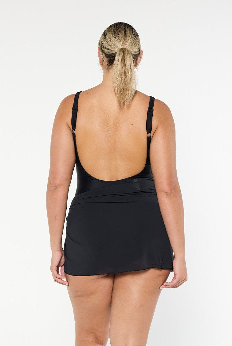 model showing back of black mesh skirt