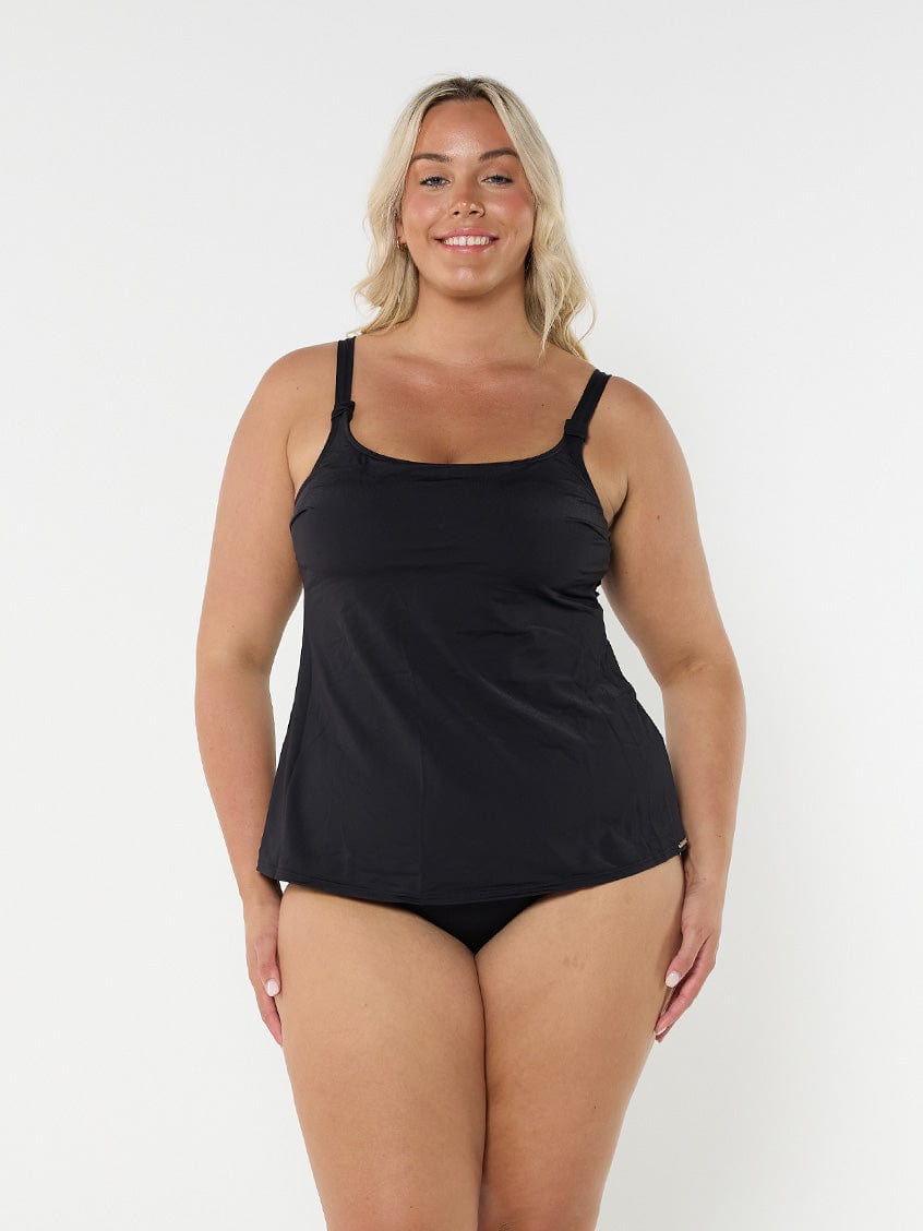model wearing black tank tankini