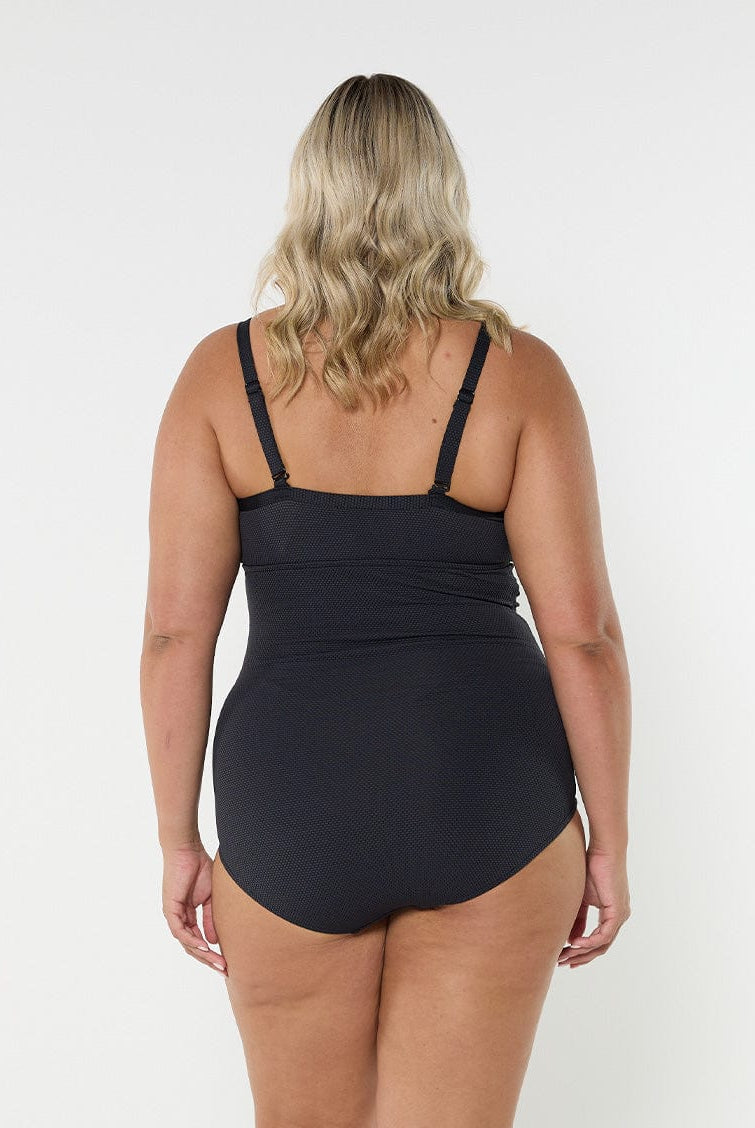 model showing back of black honey comb underwire one piece