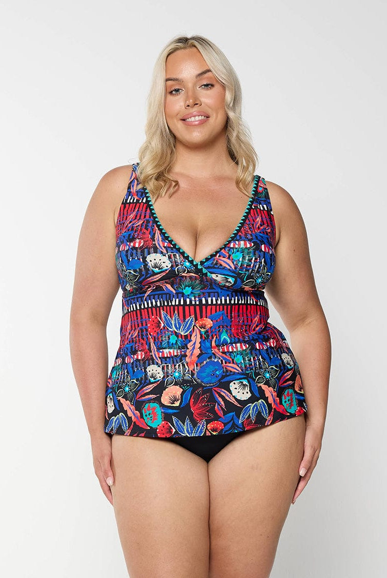 model wearing bright floral v neck tankini