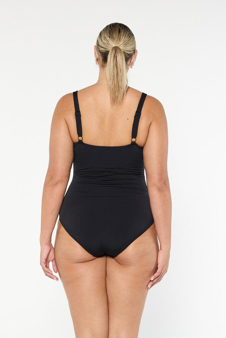 model showing back of black chlorine resistant one piece swimsuit